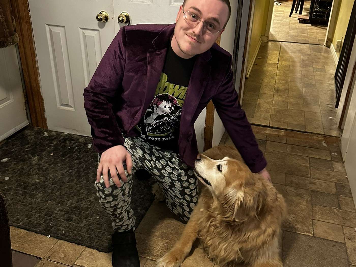 Dylan L.R. Pollock with Lexi at home.