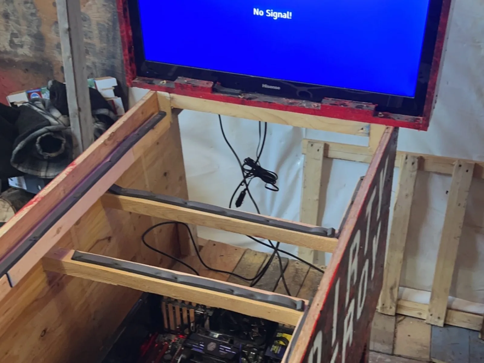 Wooden backbox frame with a mounted display